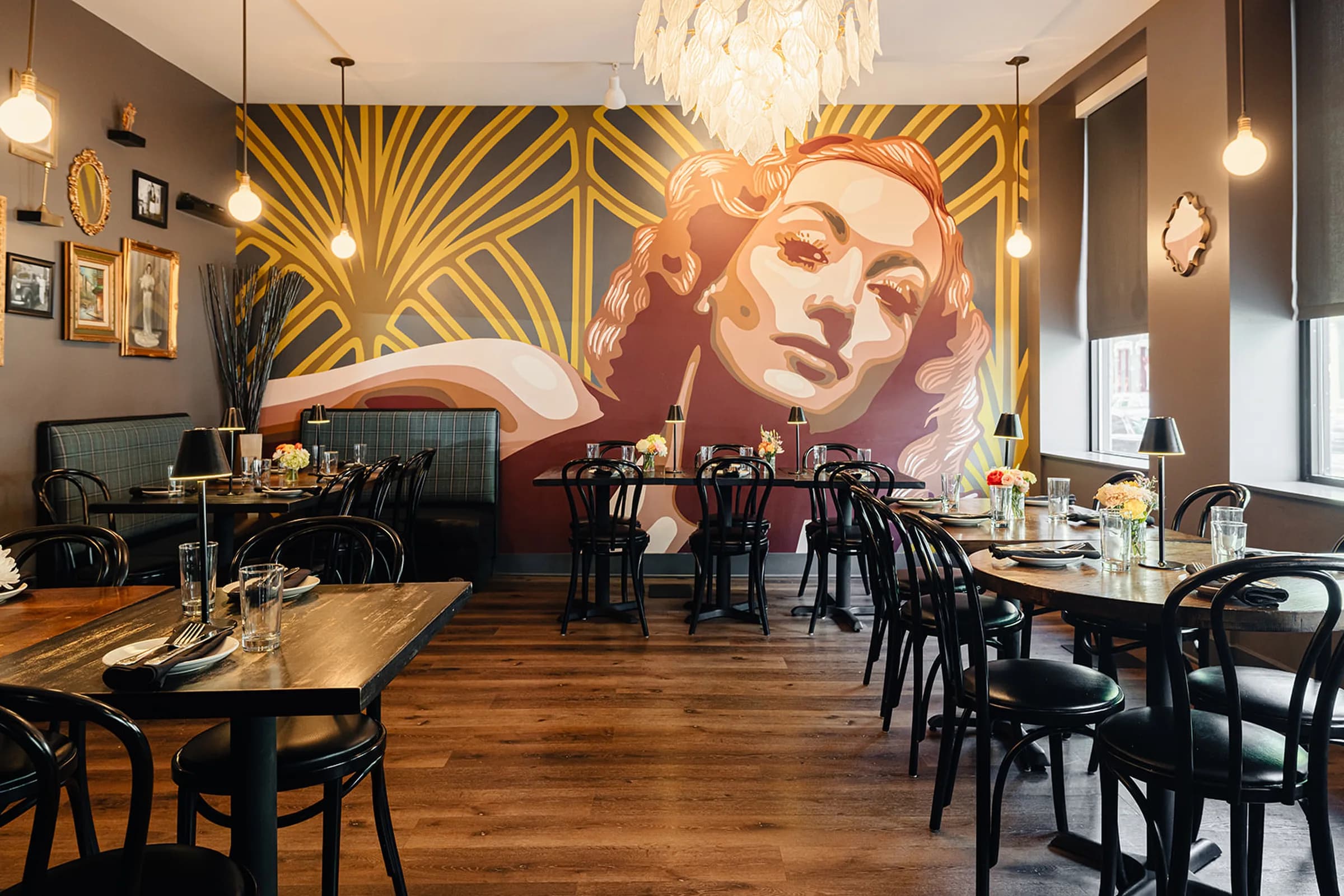 The Library — local artist's mural and chandeliers